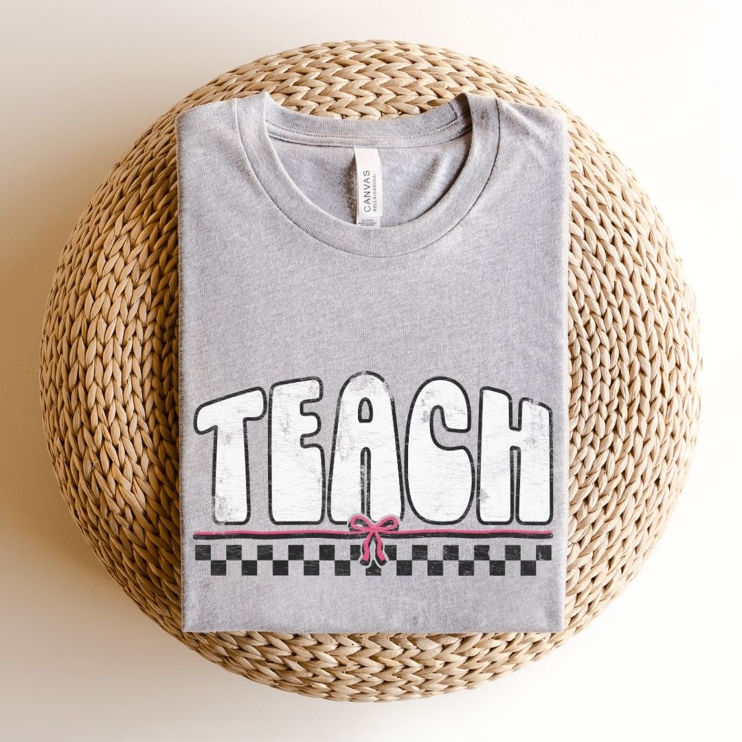 Distressed Teach with Bow Vintage Teacher T-shirt