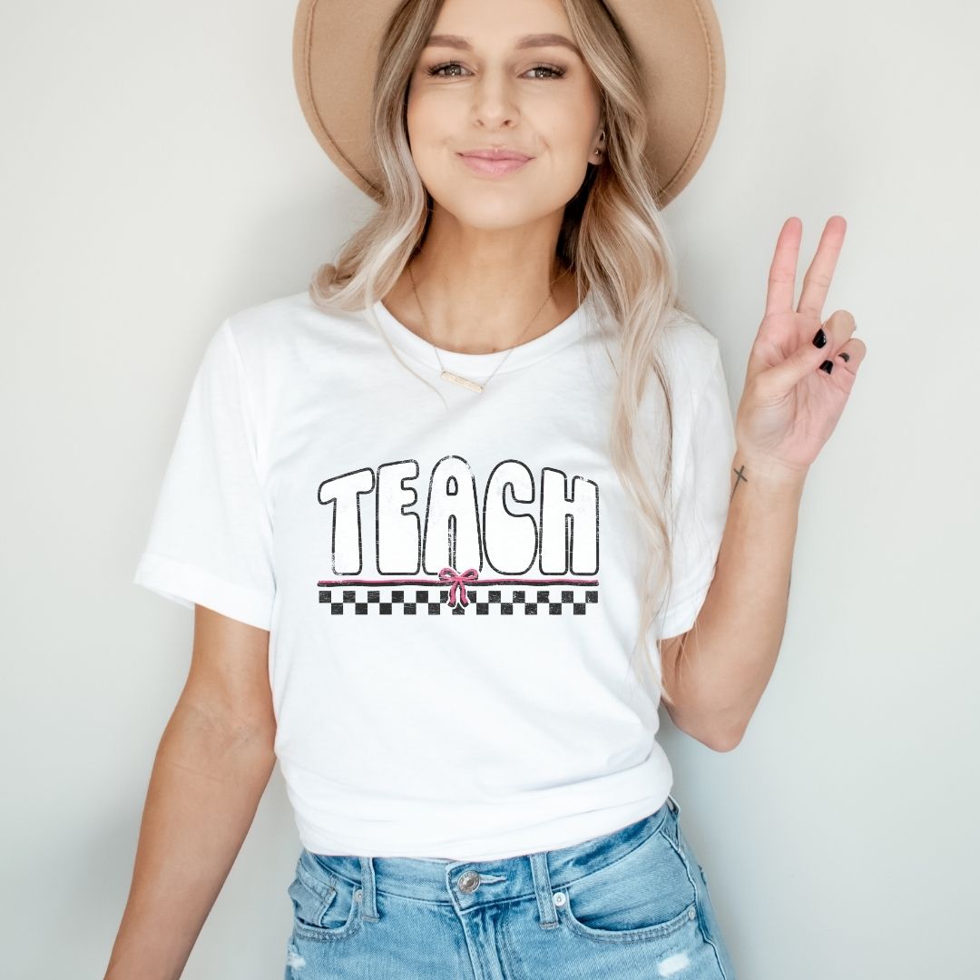 Distressed Teach with Bow Vintage Teacher T-shirt
