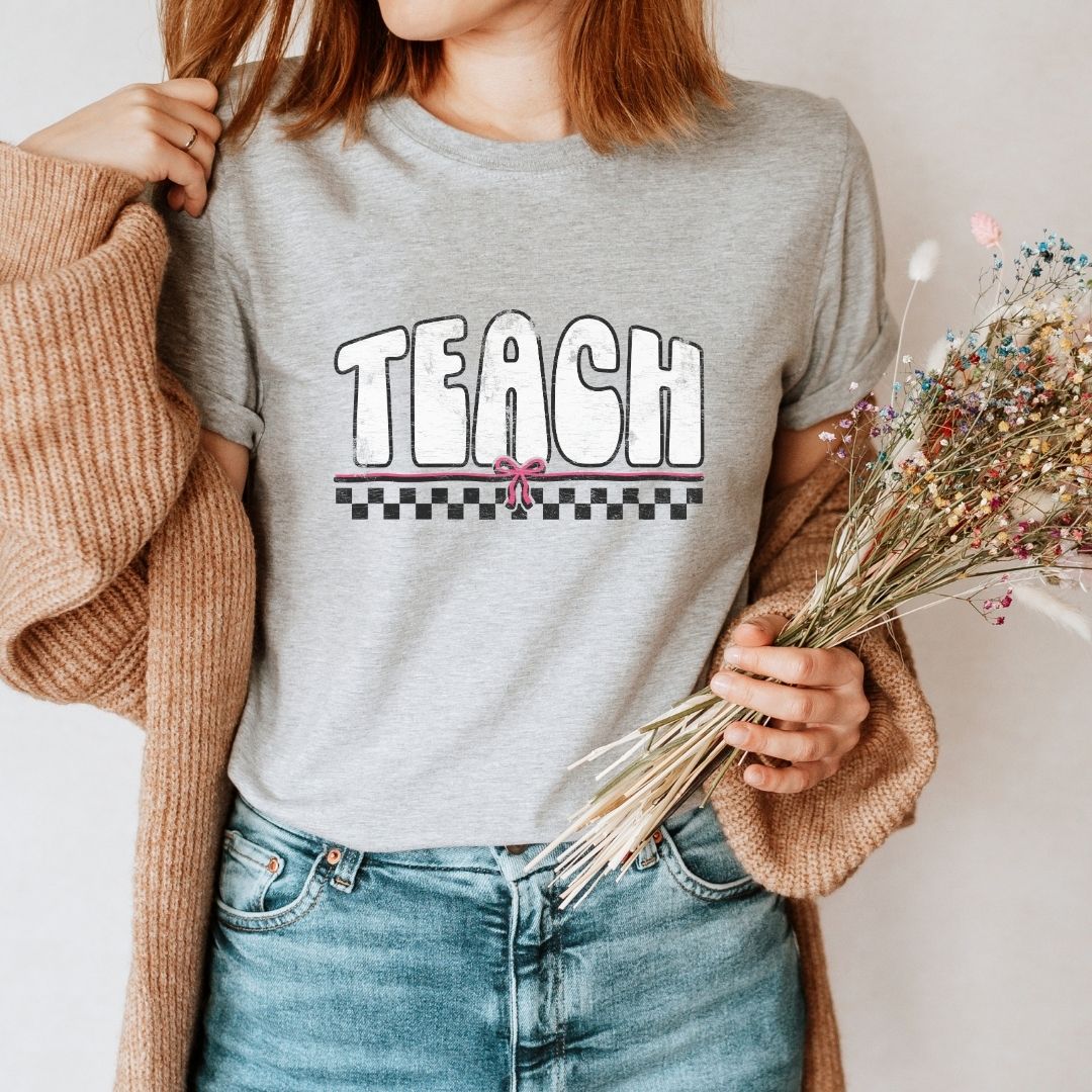 Distressed Teach with Bow Vintage Teacher T-shirt